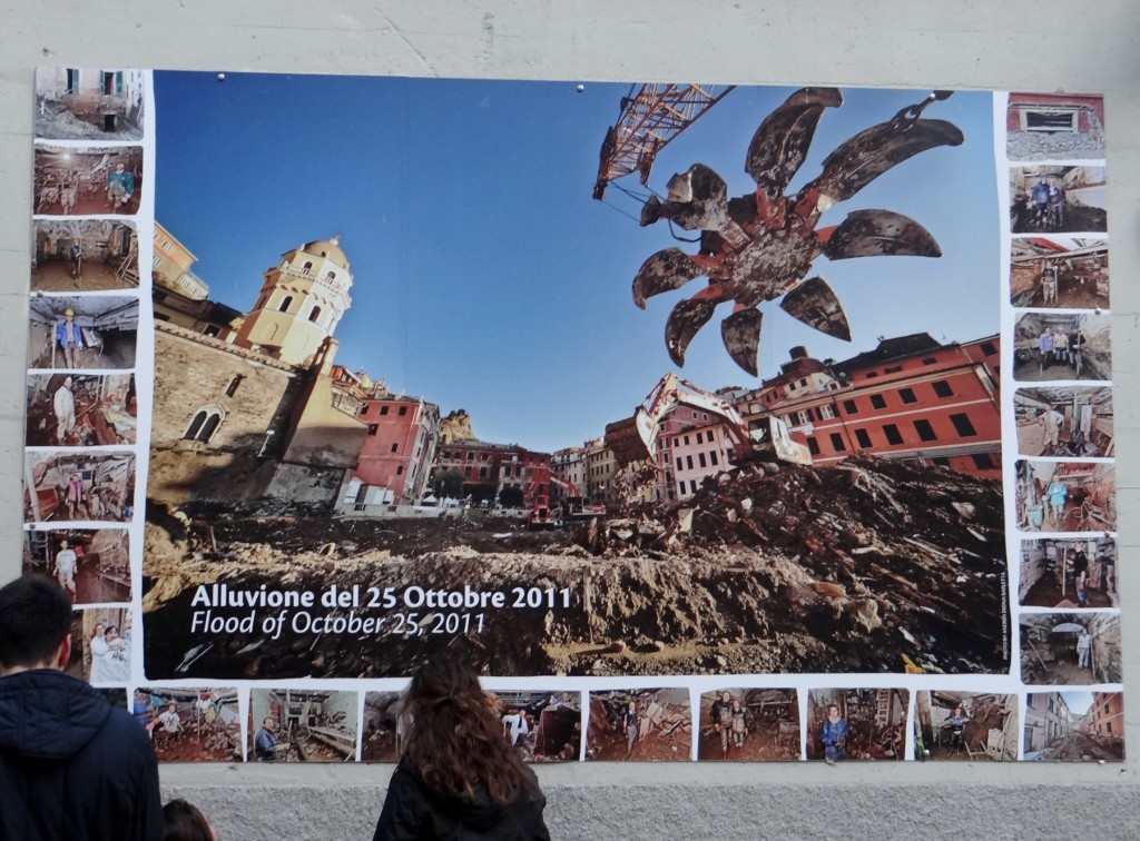 Just over a year ago Vernazza was under 4m of mud from floods - it's recovering well but the huge poster serves as a reminder.