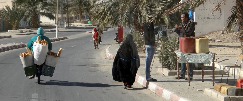 Bread delivery, local dress and a Libyan petrol station - all in one photo, not bad!