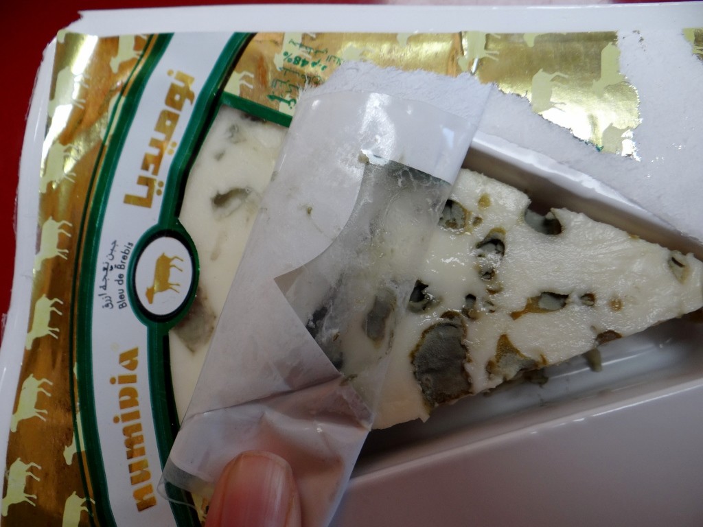 We assume this should be covered in mould - it is a blueish cheese after all.