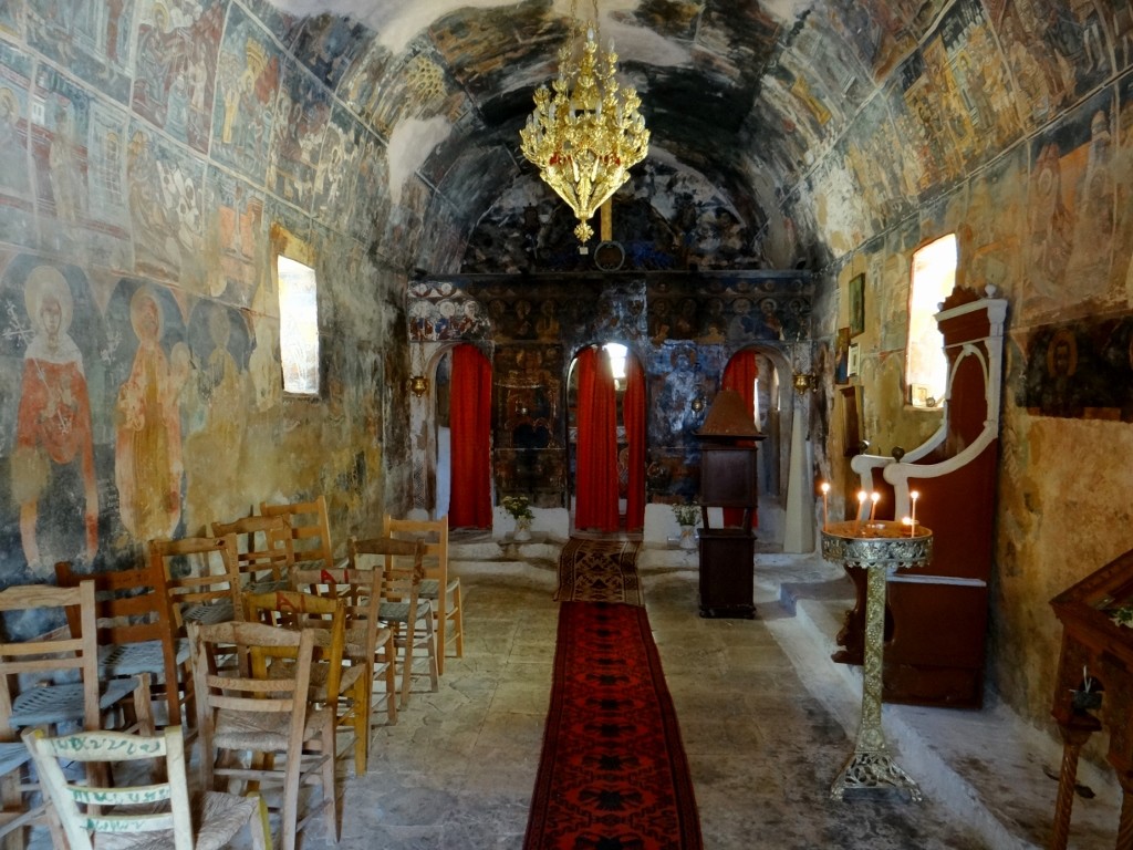 Inside its walls were covered with frescos