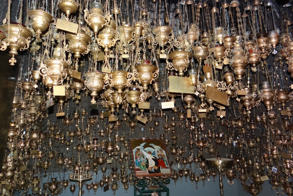 A shrine to those killed has a little lamp for each of them hanging from the ceiling - there are too many lamps.
