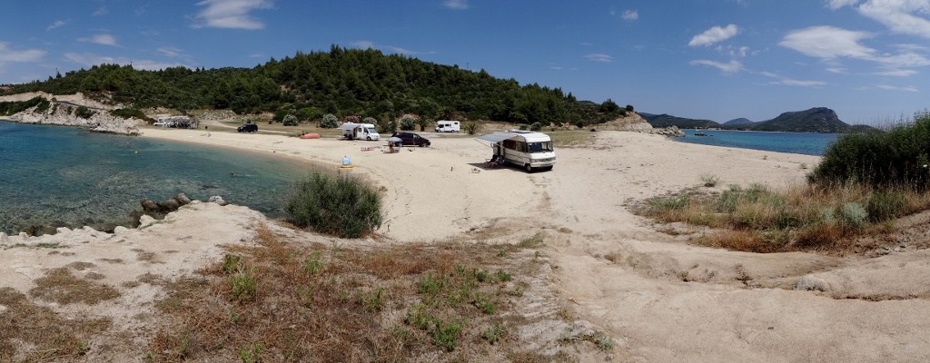 Motorhomes on a beach in Greece wild camping Toroni ourtour