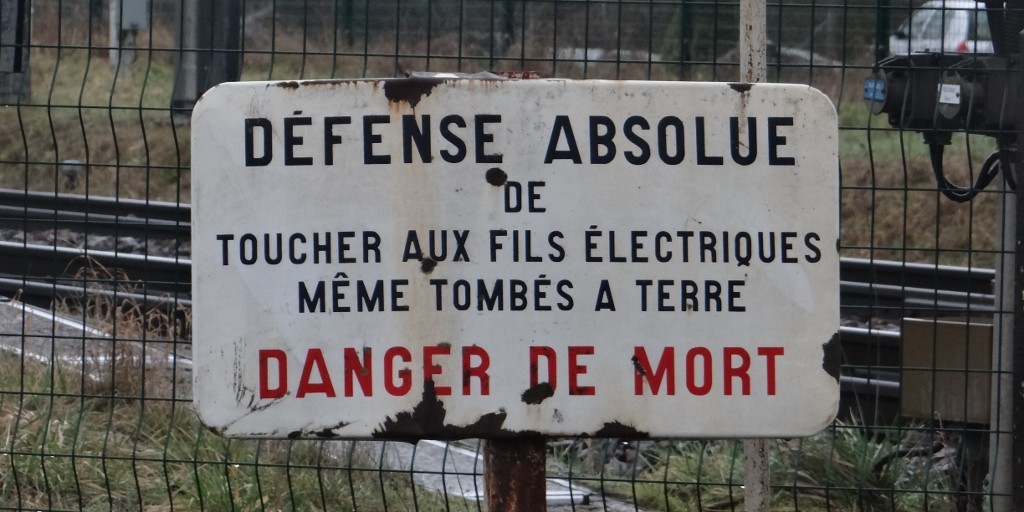 Good advice on a sign in the village: don't touch the train's electrical wires!