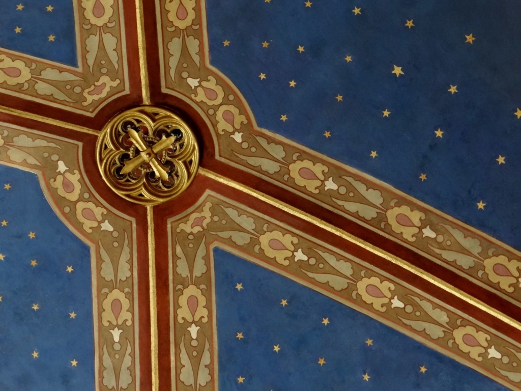 The ceiling of the cathedral is a beautiful stary blue sky