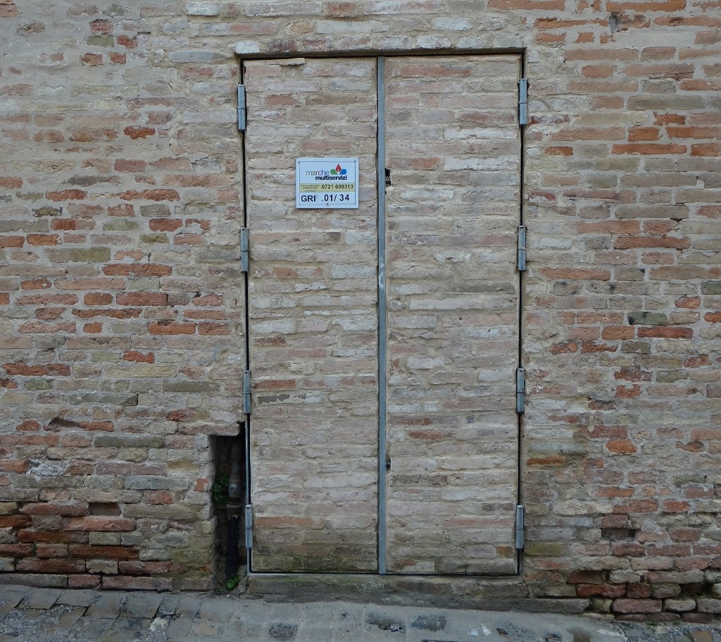 And today's door picture is: a brick-clad door, almost camouflaged it is! 