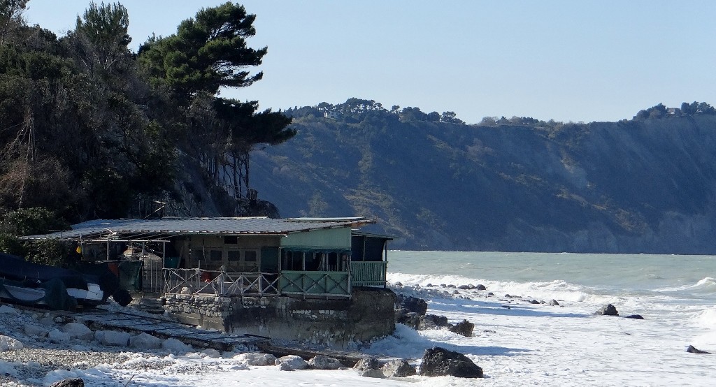 A fisherman's house up against the sea