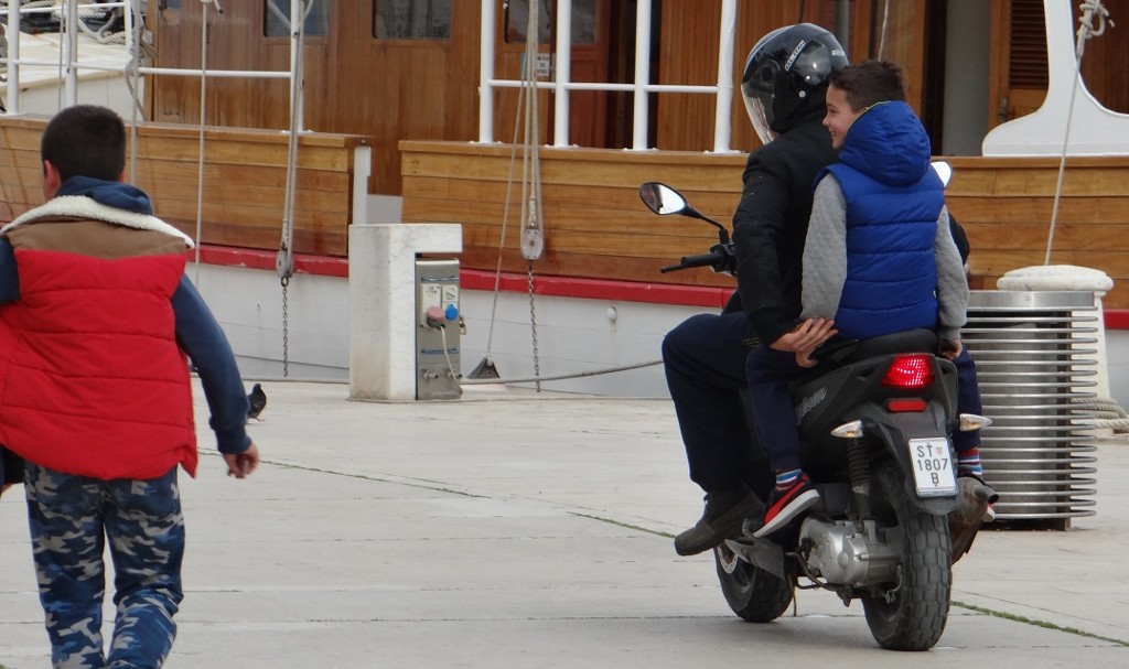 This part of Croatia is apparently more influenced by Italy than Austria. Watching this helmet-less nipper on his Dad's scooter, I can believe it