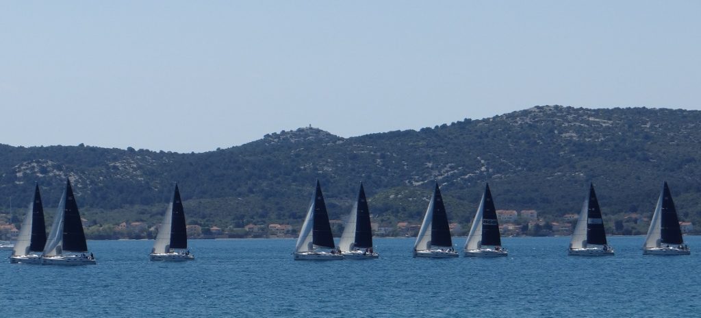 As we wrote, a flotilla of yachts floated between us and Uglijan Island