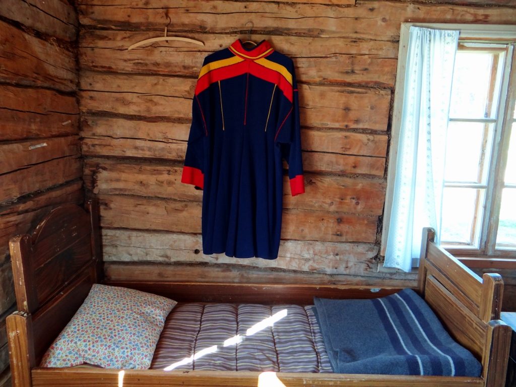 Traditional Sami tunic over a bed