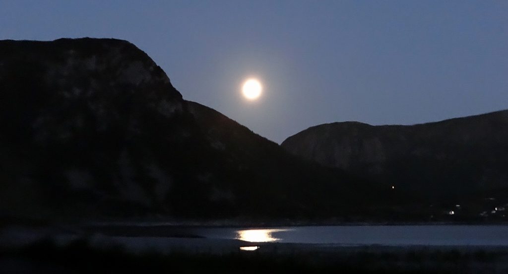 August moon rising over Haukland Beach. The sun's properly setting now 