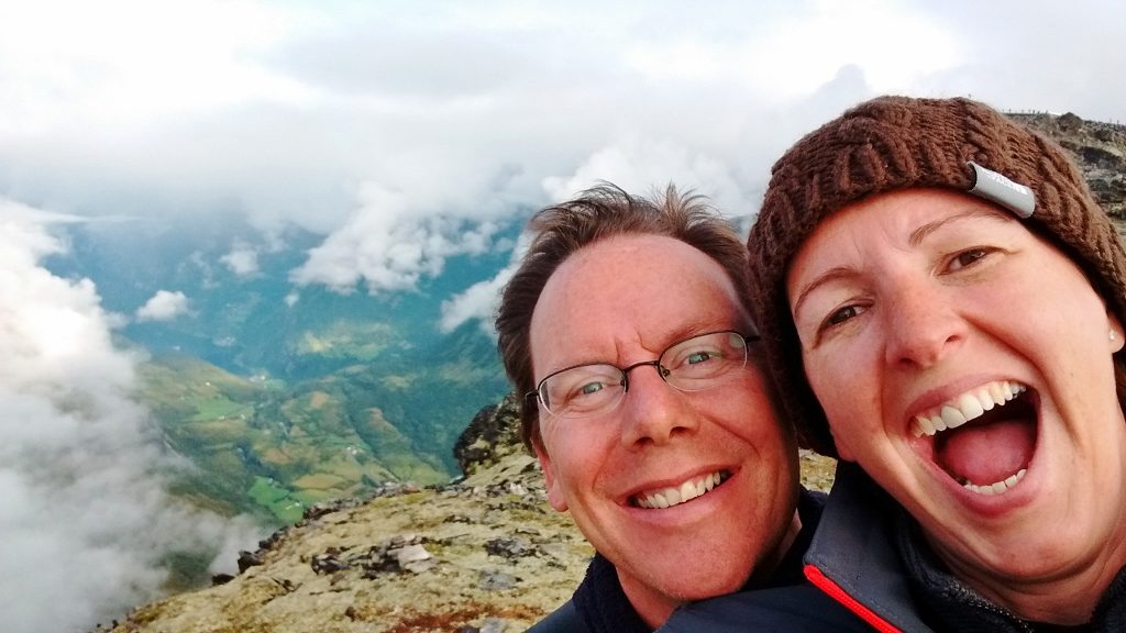 Two happy folks on Mount Dalsnibba, overlooking Geiranger