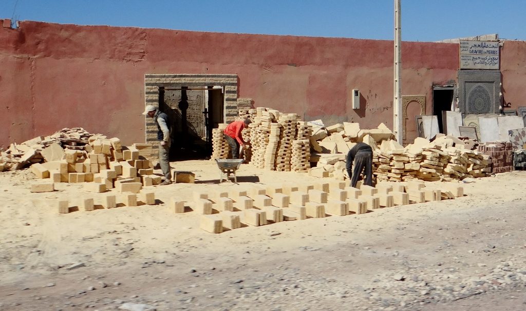 Blocks being made at the side of the road