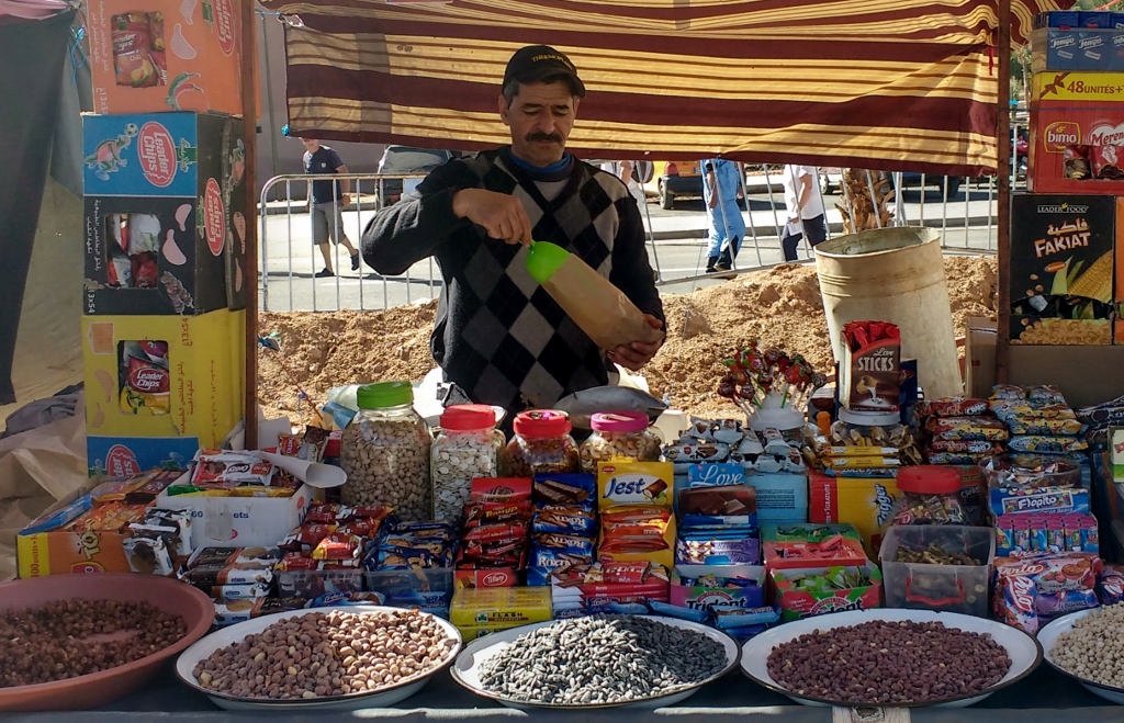 Getting some caramelised peanuts in the souk, half a kilo for 20Dh. I accidentally tried to pay 40Dh but the stall owner corrected me