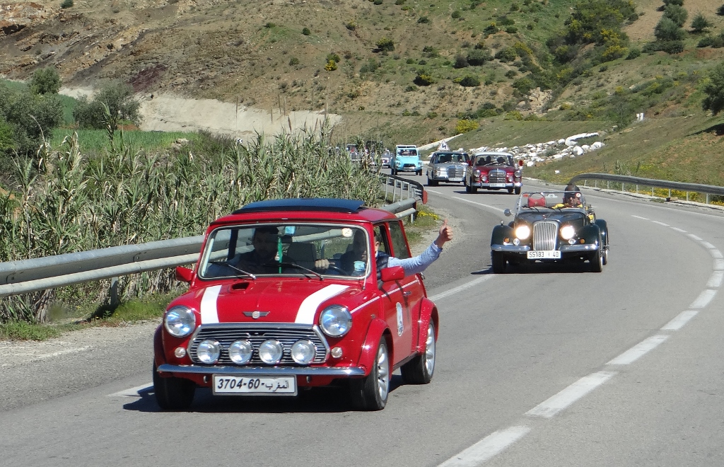 Classic cars heading south into the Rif Mountains - cue much horn honking and waving!