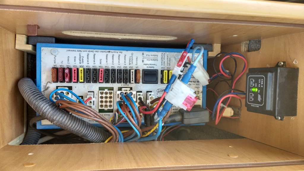 The big box is the EBL. The small black box is the ESB-2. The blue connectors either side of the fuses were a little loose, and may have been the culprits for the 12V cutting out at night.