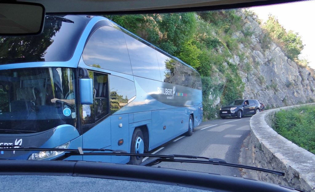 Motorhome stuck trying to pass a coach on the col du chat in France