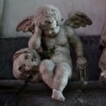 The Crying Angel in Amiens cathedral became something of a symbol of WW1, with on arm resting on a skull and another on a time piece