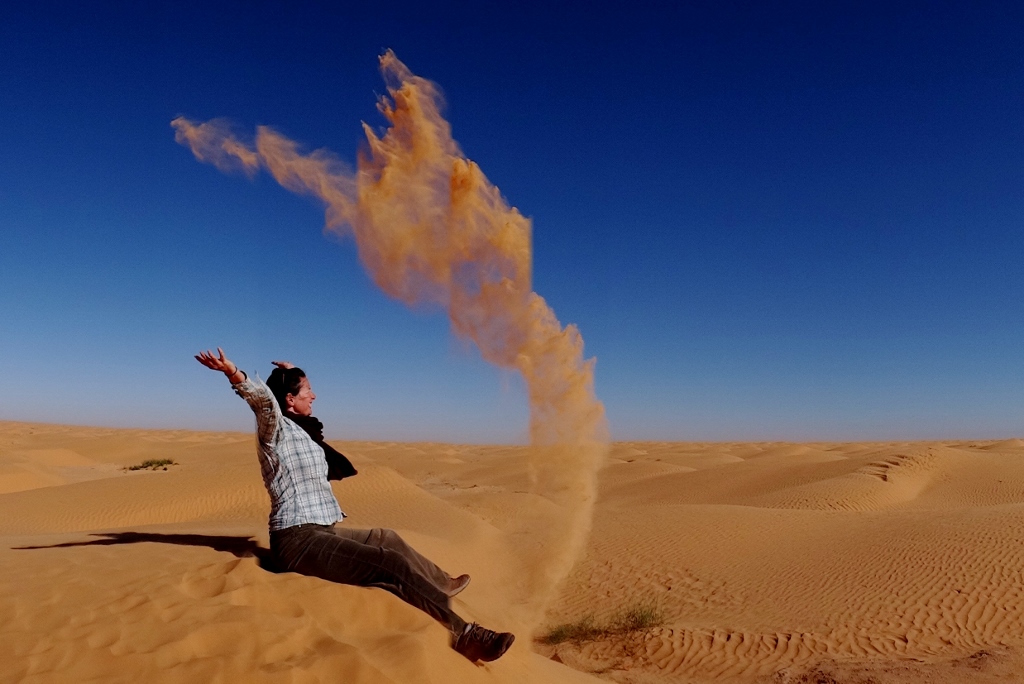 playing in Sahara sand