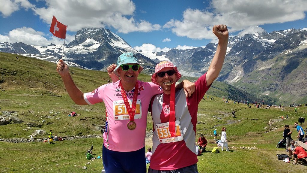 Celebrating Below the Matterhron with my mate Phil after running the Zermatt-Gornergrat Uphill Half Marathon
