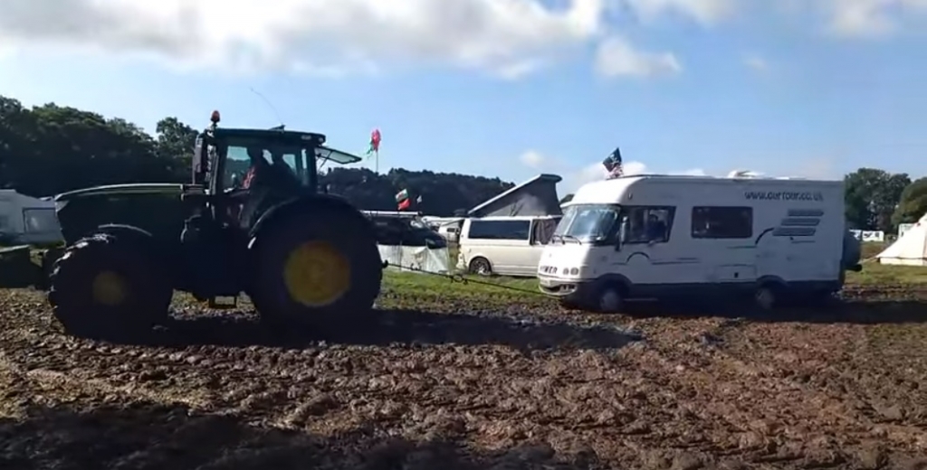 Getting towed from a field at a very muddy Carfest North