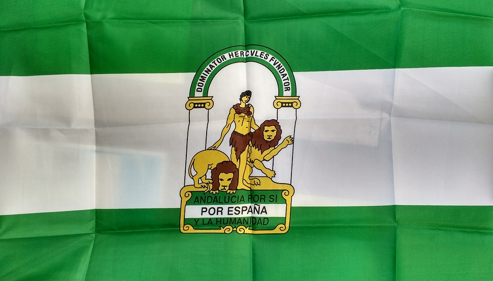 The Andalusian flag which is flown with pride all the time, not just on Andalusia Day. Nerja's paving slabs are green and white too.
