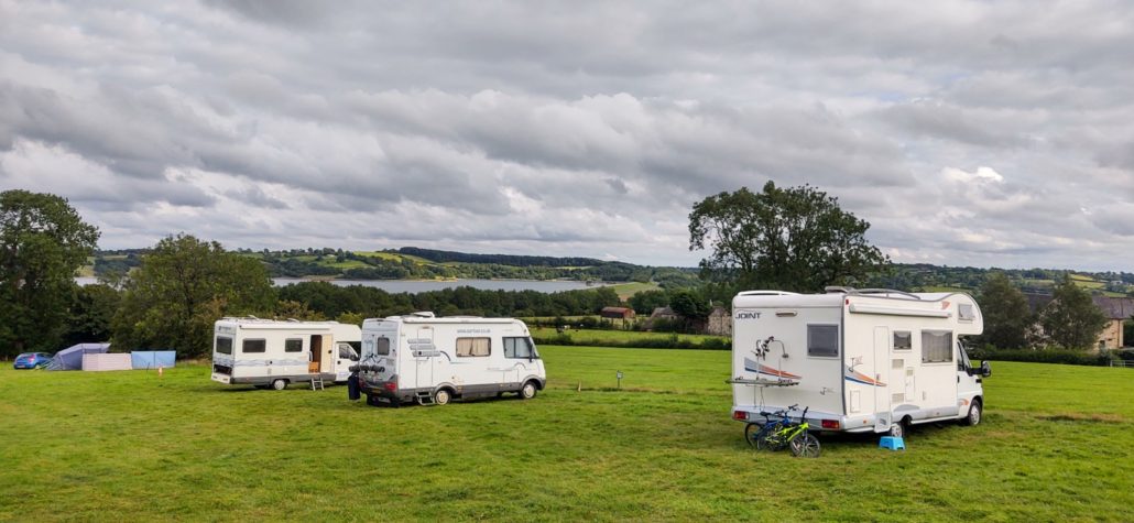 Motorhomes in the 'Sloping Field' at Uppertown Farm Campsite, Carsington Waters, Derbyshire Dales