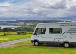 Motorhome at campsite overlooking Robin Hoods Bay