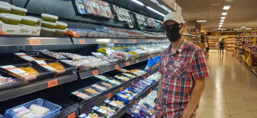 Masked up food shopping in Nerja, Spain