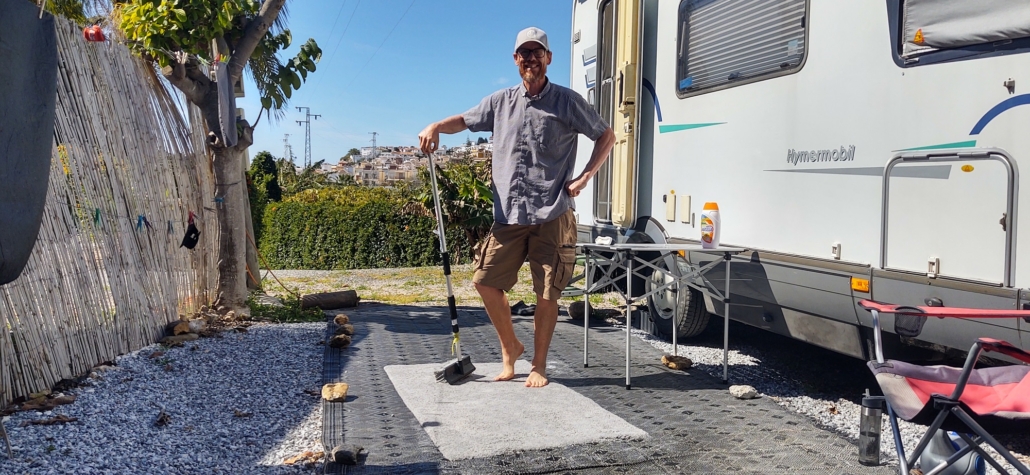 cleaning carpet on campsite