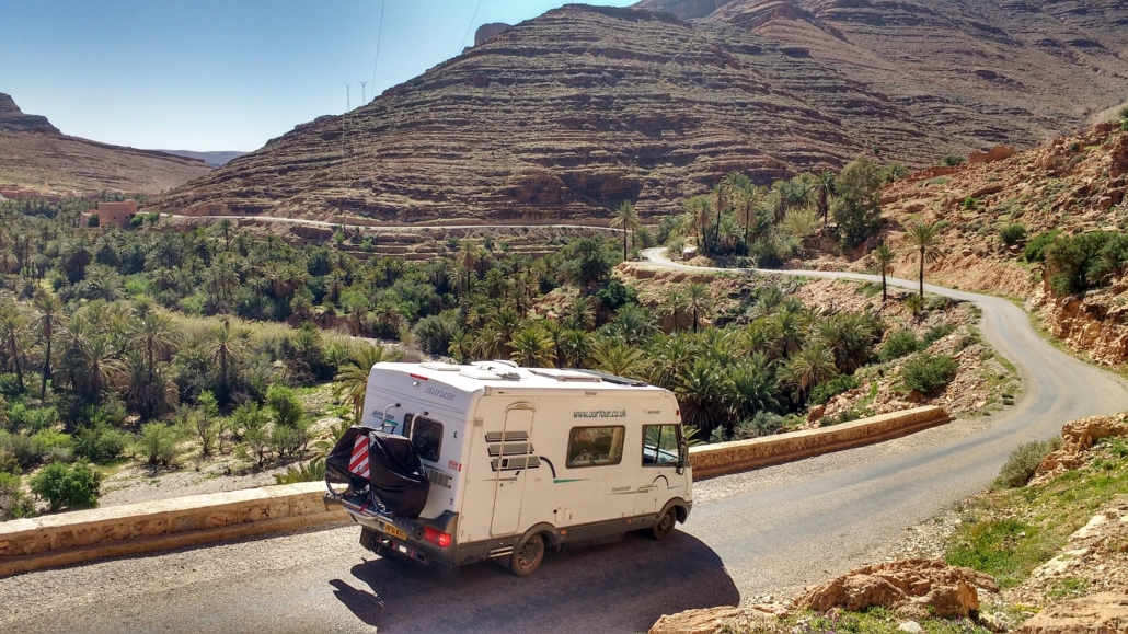 Driving through the mountain oasis of Aït Mansour in Morocco