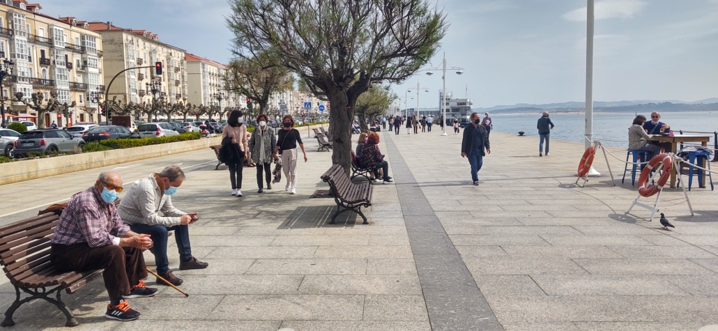 Lots of people (and masks) on the quayside in Santander in March 2021