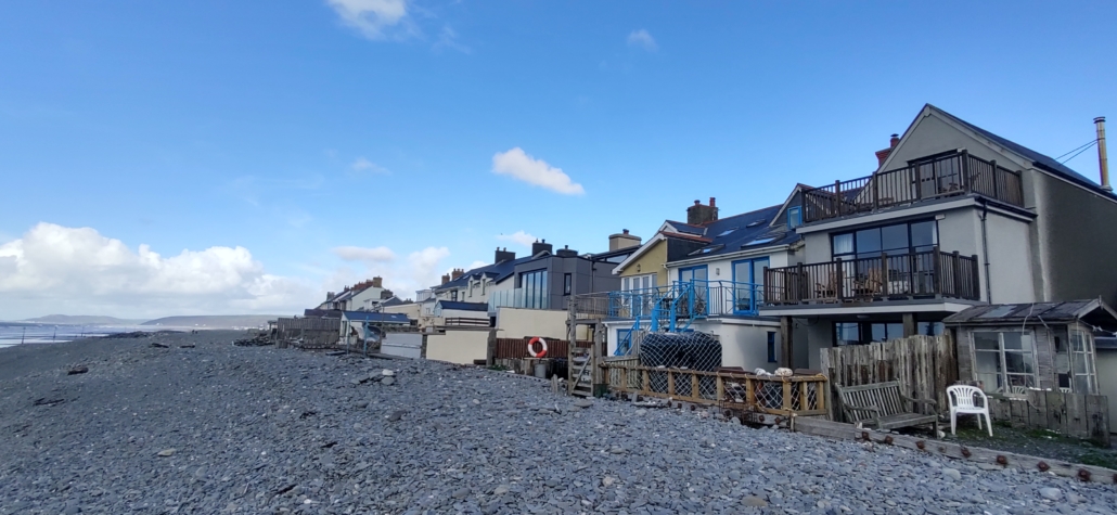 Our mate's sea-front rental house in Borth, the grey one one with two brown  balconies to the right of the photo.