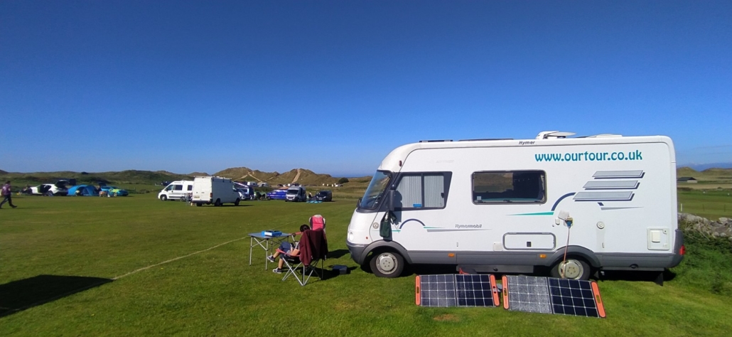 Our motorhome on a large pitch at Hillend Campsite, Gower. Jackery solar panels in the foreground