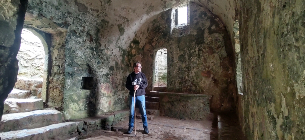 Inside St Govan's Chapel. The saint is said to be buried beneath the alter behind me