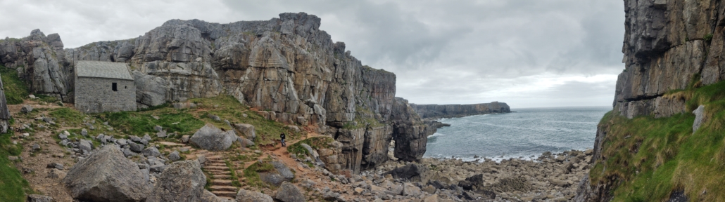 St Govan's Chapel, camouflaged in grey stone