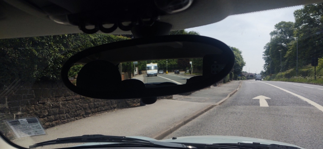 Motorhome in rear view mirror