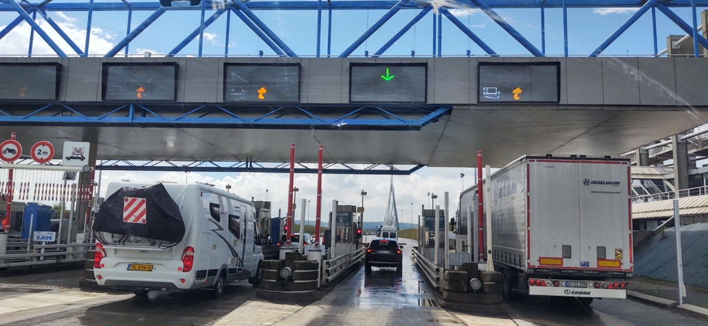 A motorhome at the toll booths for the Pond du Normandie Bridge