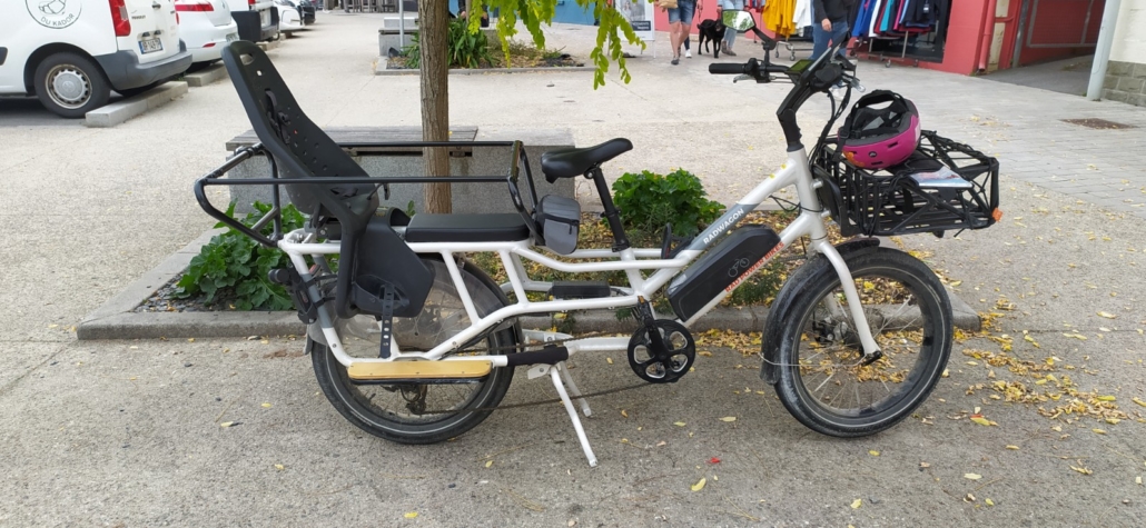 A family electric bike in town, with space for a nipper, maybe two. Reminds me of bikes in the Netherlands.