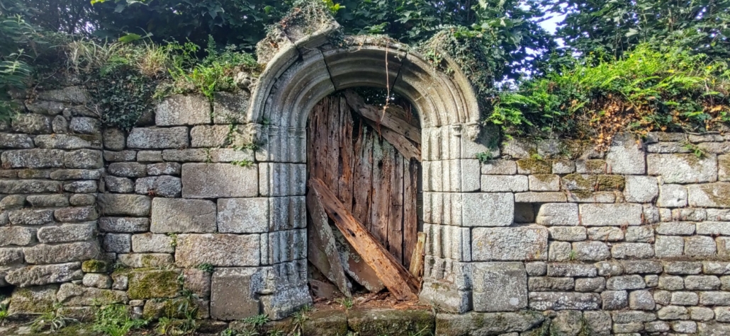 broken gate and wall