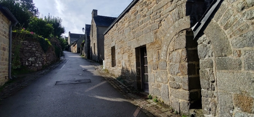 reused wall with arch in Locronan, France