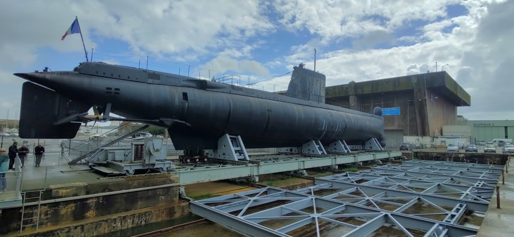 Flore, sat on the structure used to haul subs up the ramp before sliding into a pen in K1 or K2