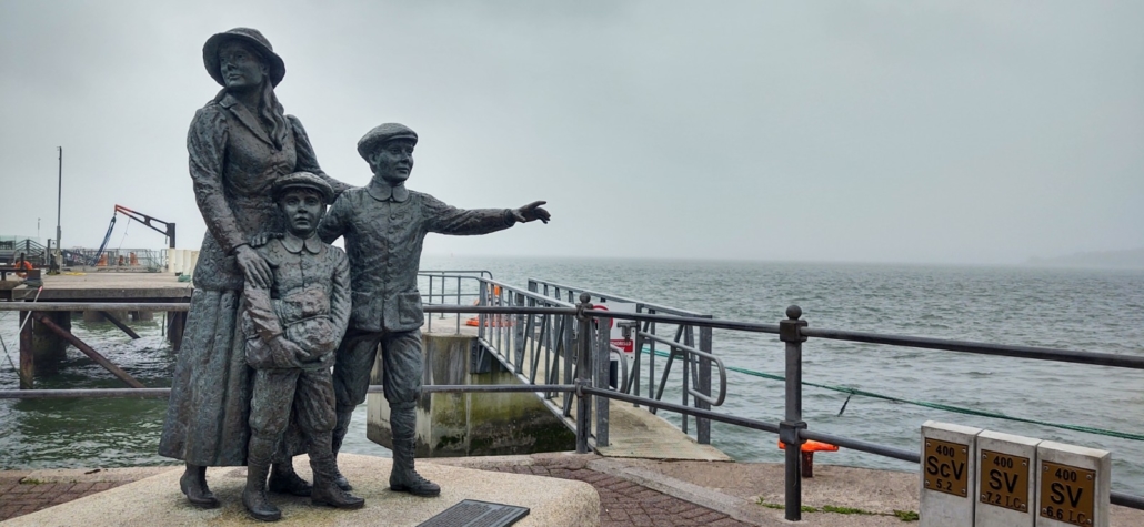 Statue at Cobh of Annie Moore and her children, the first emigrants processed at Ellis Island in New York