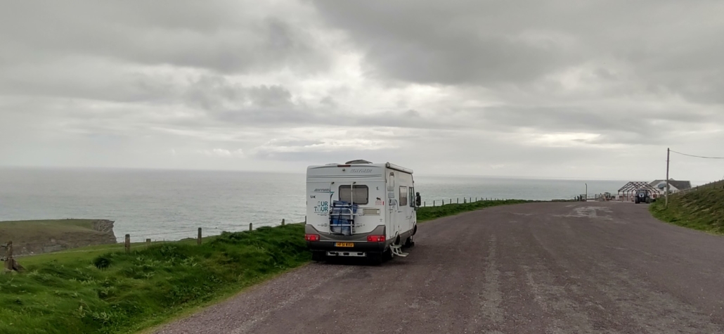Our motorhome in the large parking area at Mizen Head. We're on ramps to get level.