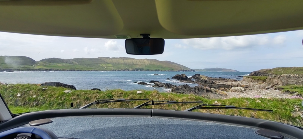 view of sea from motorhome windscreen