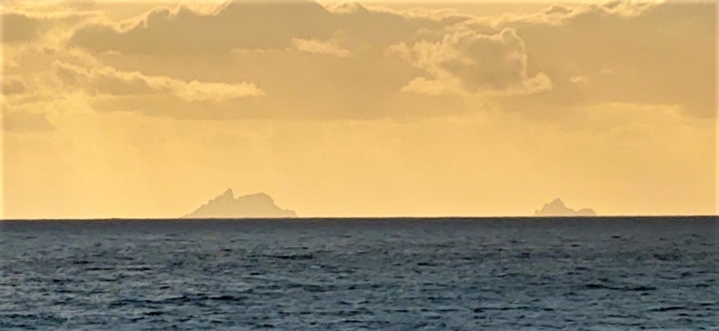 small rocky islands on the horizon