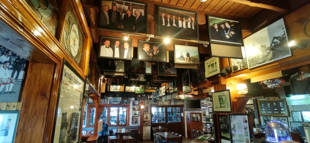 A million photos on the walls of Páidí Ó Sé's pub, Dingle Peninsula