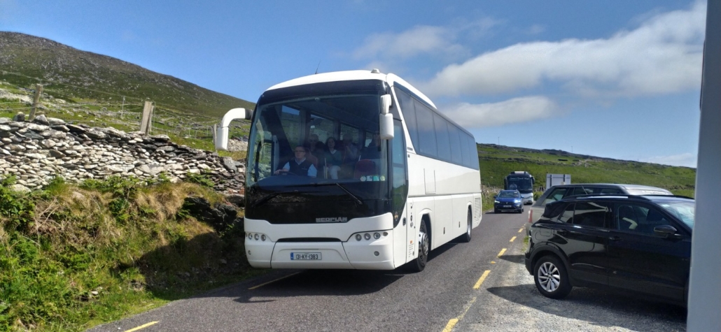 Coaches on the R559 section of the Wild Atlantic Way, Dingle Peninsula, travelling clockwise 