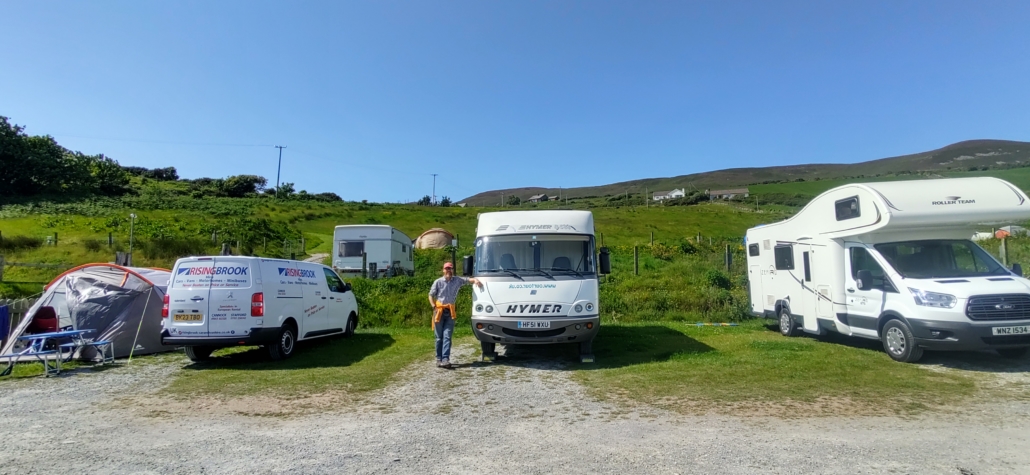 motorhomes and tents in campsite