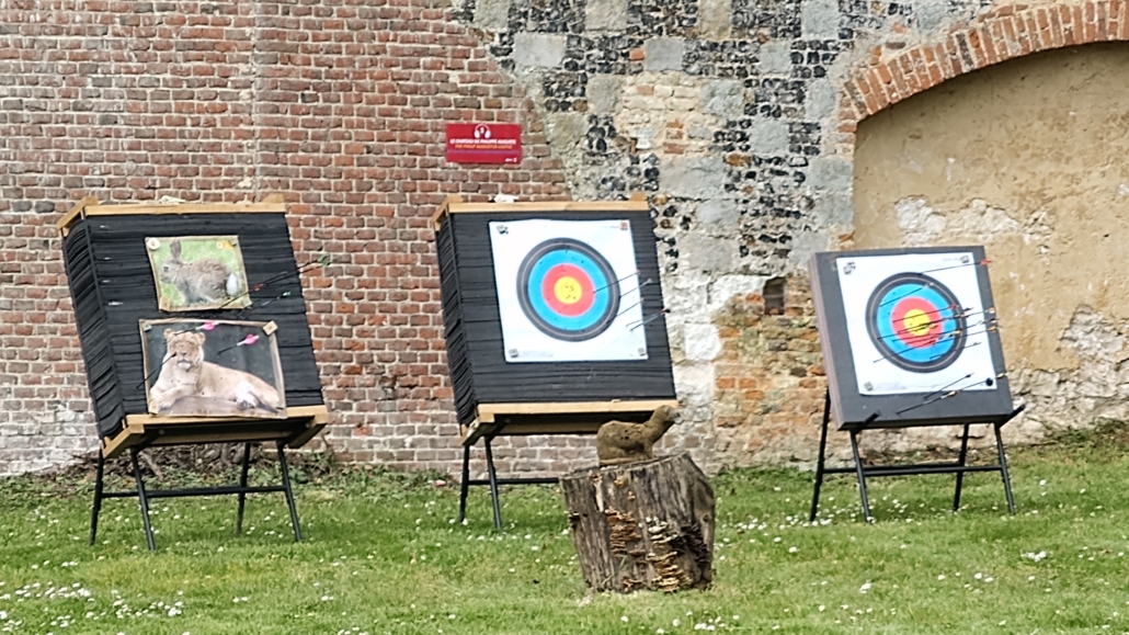 Archery practice in the citadel, using a photo of a lion and various animals for targets. Welcome to France - can't imagine this scene back in Blighty?