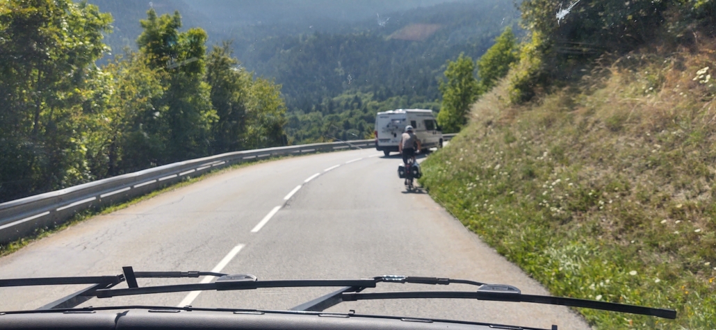 Trying to safely pass cyclists on the Col du Telegraphe without annoying all the traffic behind you is, ah, a challenge